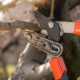 detail of professional pruning shears during winter pruning, highlighting common pruning mistakes you should avoid.