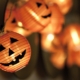 Close up string of halloween pumpkin lights