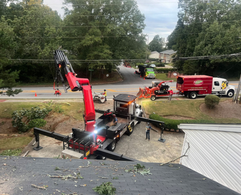 Premier Tree Solutions cleaning up someone's property after Hurricane Helene