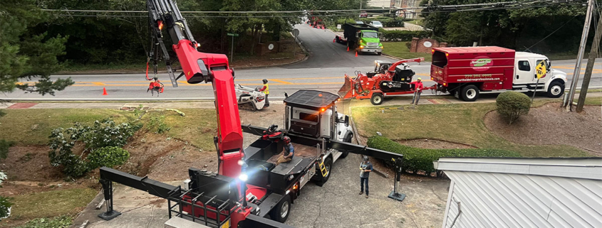 Premier Tree Solutions cleaning up someone's property after Hurricane Helene