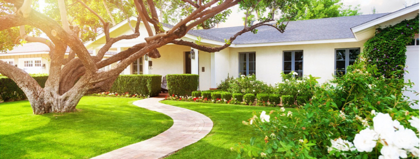 A home’s beautiful front yard and garden.